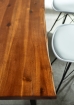 Esstisch Baumkante massiv Akazie cognac 220 x 100 schwarz Esra