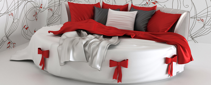 Rote Schleifen, üppiges weißes Rundbett und verspielte Tapeten: Hier harmonisiert die Schlafzimmer-Einrichtung