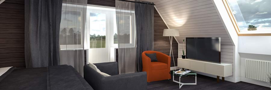Sideboard, TV und Bett nutzen in einer Dachwohnung den Platz unter den Schrägen optimal aus